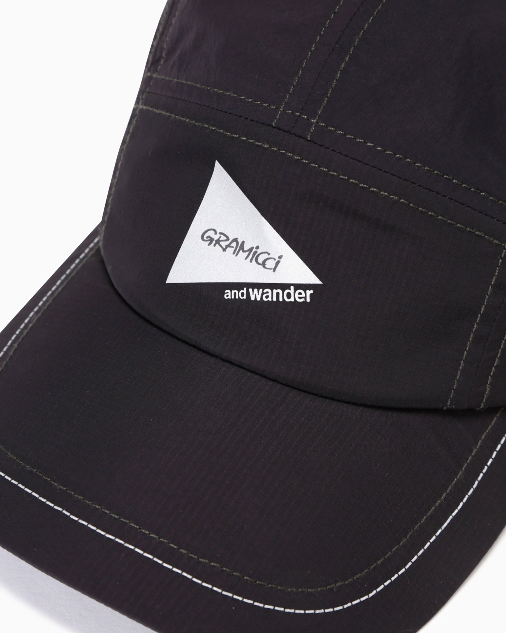 And Wander Patchwork Wind Cap - Black